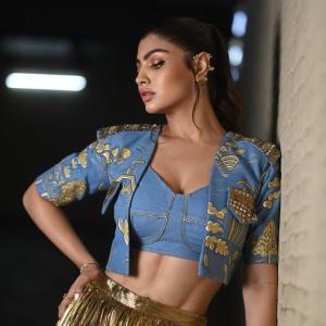 Actress Akanksha Puri Shines in Gold Pleated Skirt – Stunning Fusion Look