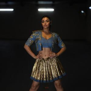Actress Akanksha Puri Shines in Gold Pleated Skirt – Stunning Fusion Look
