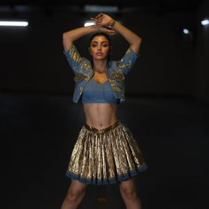 Actress Akanksha Puri Shines in Gold Pleated Skirt – Stunning Fusion Look