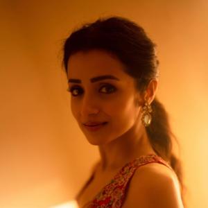 Actress Trisha Krishnan Glows in Elegant Red Embroidered Indo-Western Outfit