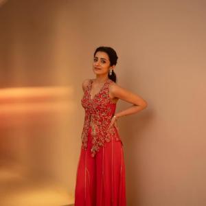 Actress Trisha Krishnan Glows in Elegant Red Embroidered Indo-Western Outfit