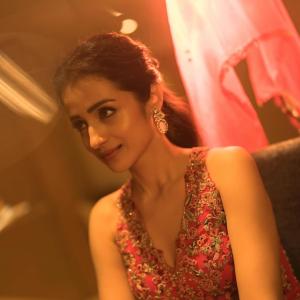 Actress Trisha Krishnan Glows in Elegant Red Embroidered Indo-Western Outfit