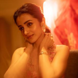 Actress Trisha Krishnan Glows in Elegant Red Embroidered Indo-Western Outfit