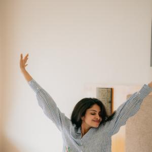 Actress Manasa Varanasi's Candid Portrait in Casual Striped Shirt