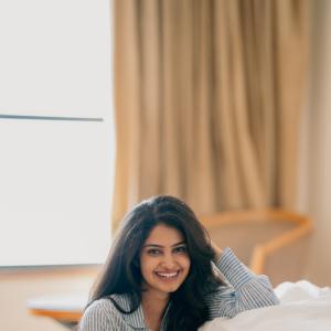 Actress Manasa Varanasi's Candid Portrait in Casual Striped Shirt