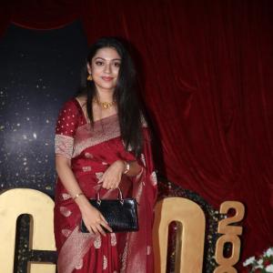 Actress Varsha Bolamma Stuns in Maroon Silk Saree at  Red Carpet Event