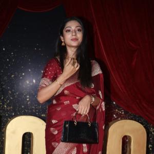 Actress Varsha Bolamma Stuns in Maroon Silk Saree at  Red Carpet Event