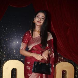 Actress Varsha Bolamma Stuns in Maroon Silk Saree at  Red Carpet Event