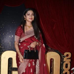 Actress Varsha Bolamma Stuns in Maroon Silk Saree at  Red Carpet Event