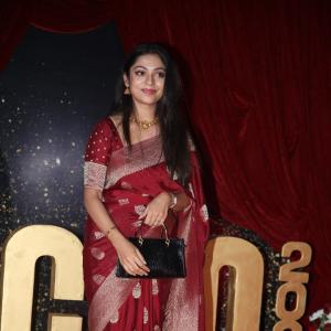 Actress Varsha Bolamma Stuns in Maroon Silk Saree at  Red Carpet Event