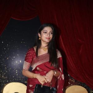 Actress Varsha Bolamma Stuns in Maroon Silk Saree at  Red Carpet Event