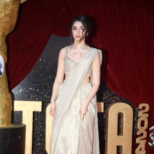 Actress Kriti Shetty Dazzles in Golden Saree at Event