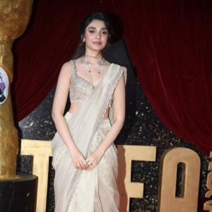 Actress Kriti Shetty Dazzles in Golden Saree at Event