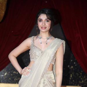 Actress Kriti Shetty Dazzles in Golden Saree at Event