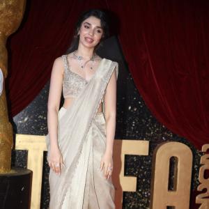 Actress Kriti Shetty Dazzles in Golden Saree at Event