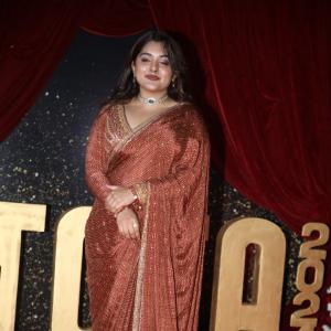 Actress Nivetha Thomas Glows in Maroon Saree at Grand Red Carpet Event