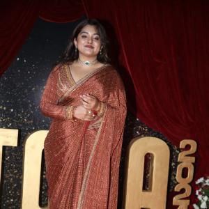 Actress Nivetha Thomas Glows in Maroon Saree at Grand Red Carpet Event