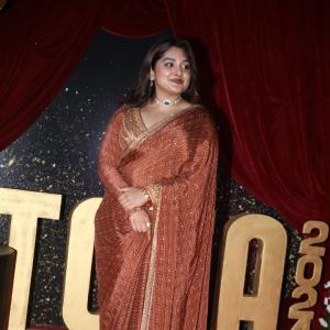 Actress Nivetha Thomas Glows in Maroon Saree at Grand Red Carpet Event