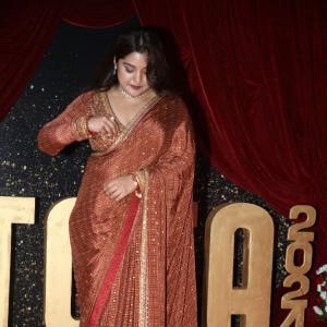 Actress Nivetha Thomas Glows in Maroon Saree at Grand Red Carpet Event