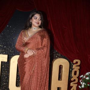 Actress Nivetha Thomas Glows in Maroon Saree at Grand Red Carpet Event