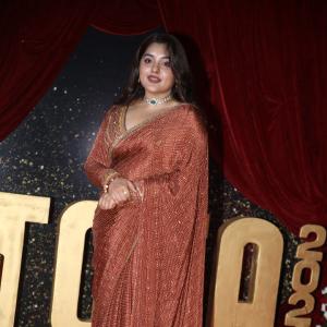 Actress Nivetha Thomas Glows in Maroon Saree at Grand Red Carpet Event
