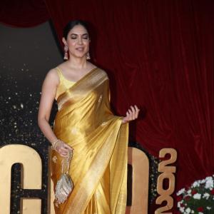 Actress Ritu Varma Shines in Golden Silk Saree at 2024 Red Carpet Event