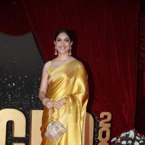 Actress Ritu Varma Shines in Golden Silk Saree at 2024 Red Carpet Event
