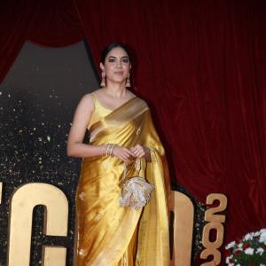 Actress Ritu Varma Shines in Golden Silk Saree at 2024 Red Carpet Event