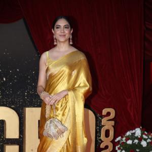 Actress Ritu Varma Shines in Golden Silk Saree at 2024 Red Carpet Event