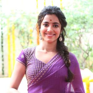 Actress Shivani Nagaram Glows in Traditional Purple Saree at Festive Event