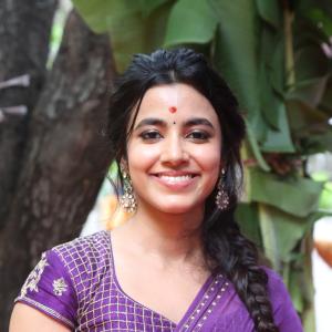 Actress Shivani Nagaram Glows in Traditional Purple Saree at Festive Event