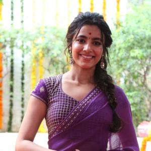 Actress Shivani Nagaram Glows in Traditional Purple Saree at Festive Event