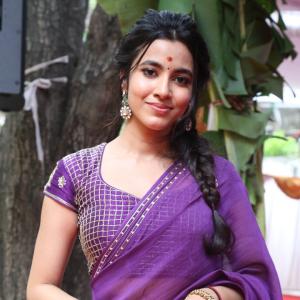 Actress Shivani Nagaram Glows in Traditional Purple Saree at Festive Event