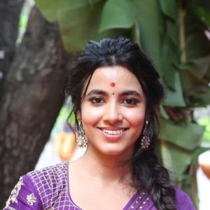 Actress Shivani Nagaram Glows in Traditional Purple Saree at Festive Event