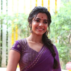 Actress Shivani Nagaram Glows in Traditional Purple Saree at Festive Event