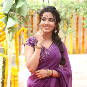 Actress Shivani Nagaram Glows in Traditional Purple Saree at Festive Event