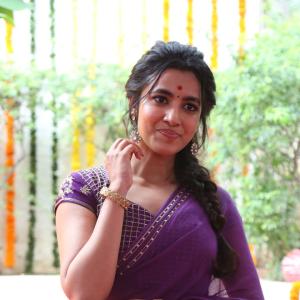 Actress Shivani Nagaram Glows in Traditional Purple Saree at Festive Event