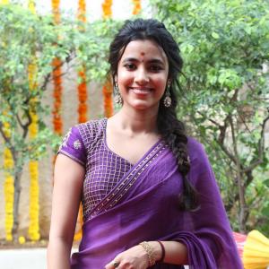 Actress Shivani Nagaram Glows in Traditional Purple Saree at Festive Event