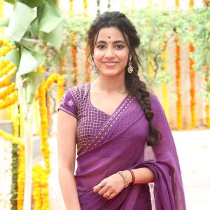 Actress Shivani Nagaram Glows in Traditional Purple Saree at Festive Event