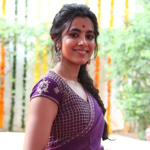 Actress Shivani Nagaram Glows in Traditional Purple Saree at Festive Event