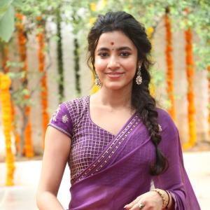 Actress Shivani Nagaram Glows in Traditional Purple Saree at Festive Event
