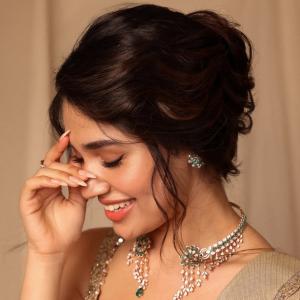 Actress Kriti Shetty Stunning in Beige Saree with Elegant Silver Embellishments - Fashion & Beauty