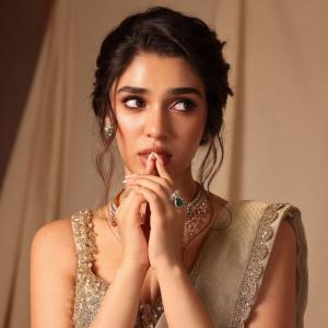 Actress Kriti Shetty Stunning in Beige Saree with Elegant Silver Embellishments - Fashion & Beauty