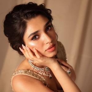 Actress Kriti Shetty Stunning in Beige Saree with Elegant Silver Embellishments - Fashion & Beauty