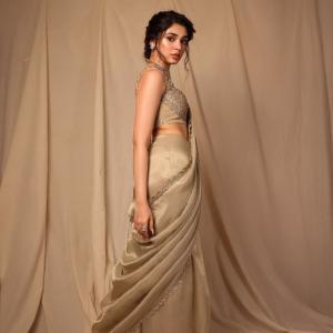 Actress Kriti Shetty Stunning in Beige Saree with Elegant Silver Embellishments - Fashion & Beauty