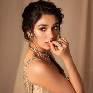 Actress Kriti Shetty Stunning in Beige Saree with Elegant Silver Embellishments - Fashion & Beauty