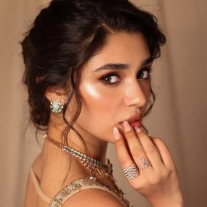 Actress Kriti Shetty Stunning in Beige Saree with Elegant Silver Embellishments - Fashion & Beauty