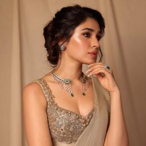 Actress Kriti Shetty Stunning in Beige Saree with Elegant Silver Embellishments - Fashion & Beauty