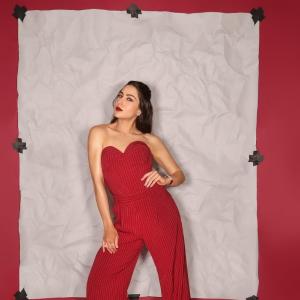 Actress Sara Ali Khan Exudes Elegance in Red Pinstripe Jumpsuit