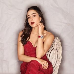 Actress Sara Ali Khan Exudes Elegance in Red Pinstripe Jumpsuit